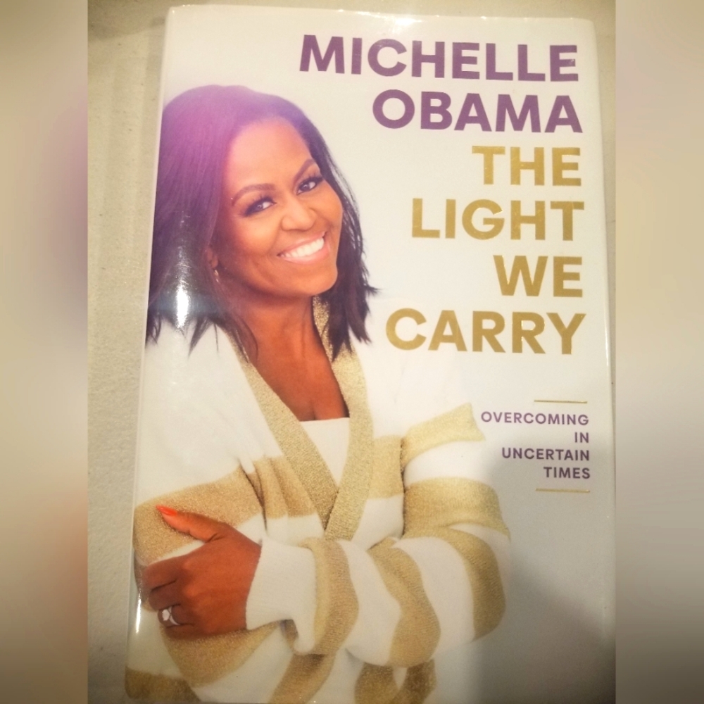Pre Owned Never Read Michelle Obama  Book "The Light We Carry"
